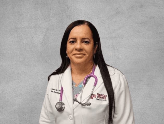 Doctor with purple stethoscope and clinic badge