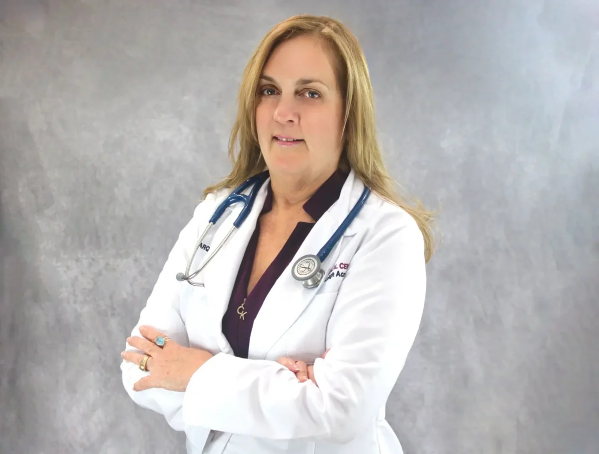 Medical doctor in white coat with stethoscope